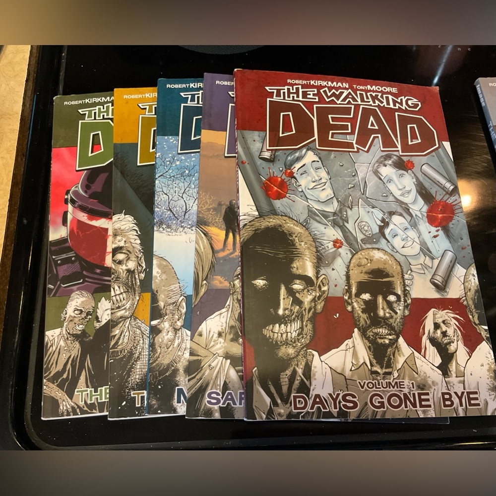 Walking Dead: comic books set of 5 books series 1 thou 5. Do not ship over 5 lbs